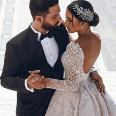 a man in a tuxedo and a woman in a wedding dress