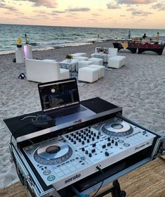 there is a dj set up on the beach