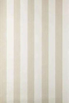 a white and beige striped wallpaper with vertical stripes on the walls in an empty room