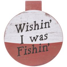 a wooden sign that says, wishin'i was fishin '