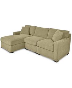 a large sectional couch with two recliners on the back and one end facing it