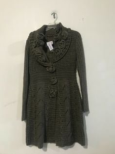 NWT John Fashion Wool Size M Olive Green Cable Knit Ribbed Crochet Cardigan Floral Flap Jacket Stylish Mid Ridge Dress Sweater Women Stylish Floral Bold Buttons Measurements Chest 21 inches arm pit to arm pit Length 35 inches shoulder to hem 55% wool 45% polyester Ribbed Crochet, Dress Sweater, Green Cardigan, Sweater Women, Crochet Cardigan, Stylish Women, Cable Knit, Sweater Outfits, Jacket Dress