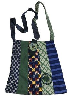 a multicolored bag with ties hanging from it's side and on the front