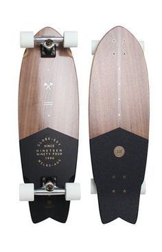 two skateboards side by side, one black and the other brown with white wheels