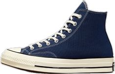 Classic Navy High-top Sneakers, Classic Navy Sneakers With Round Toe, Classic Converse High-top Sneakers For Sports, Casual Converse Sneakers With Rubber Heel Cap, Navy Round Toe Sneakers With Gum Sole, Navy Canvas Sneakers With Rubber Sole, Sporty Navy Cotton Sneakers, Casual Navy Sneakers With Rubber Sole, Casual Navy High-top Sneakers With Rubber Sole