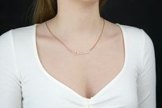 "14K Gold Filled Name Necklace, Personalized Name Necklace, Gold Name Necklace, Cursive Dainty Name Necklace, Silver Name Plate Necklace E T E R N I T Y ∙ N E C K L A C E * Handmade item, * Material: High Quality Solid 925 Sterling Silver * Finish: Sterling Silver ∙ 14K Gold Filled ∙ 14K Rose Gold Filled * All our work is custom made by hand with Love and Care in our workshop ♥ Chain Length: 14\" - 22\" Chain Style.: Box Model wears a 17 inch necklace. Necklaces are measured from end-to-end, exc Elegant Custom Name Jewelry For Christmas, Custom Name Jewelry For Christmas Wedding, Custom Name Necklace For Christmas Party, Personalized Jewelry For Christmas Wedding, Personalized Jewelry For Wedding And Christmas, Custom Name Rose Gold Jewelry For Christmas, Custom Name Necklace For Christmas Wedding, Name Necklace For Wedding Christmas Gift, Custom Name Sterling Silver Necklace In Gold