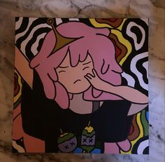 a painting of a girl with pink hair on a marble counter top next to a wall