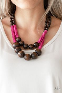 Earthy brown and vivacious pink wooden beads and discs are threaded along shiny strands of brown cording, creating colorful layers. Features a button loop closure.  Sold as one individual necklace. Includes one pair of matching earrings. Collar Rosa, Paparazzi Accessories Jewelry, Wooden Bead Necklaces, Earthy Brown, Bling Necklace, Wooden Necklace, Wood Necklace, Pink Necklace, Jewelry Images