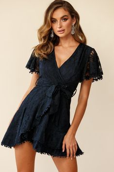 Hey pretty lady, you're causing quite a stir in our sweet, lace Cami dress! Featuring a faux wrap skirt, separate lace belt, on-trend ruffle hemline, pretty embroidered trim detailing, fluttery angel sleeves, partial lining and invisible zipper closure. Team it with delicate gold jewelry and nude heels for a look we are loving. Lace Cami Dress, Hot Party Dresses, Lace Belt, Delicate Gold Jewelry, Faux Wrap Skirt, Selfie Leslie, Angel Sleeves, Embroidered Trim, Angel Sleeve