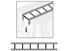 a white table topped with a black and white film strip