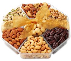 an assortment of nuts in a hexagonal container