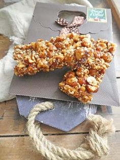 some kind of granola bar sitting on top of a table next to a rope