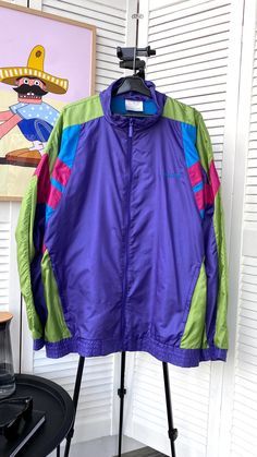 FOLLOW MY SHOP TO CHECK DAILY UPDATES & PRICE DROPS Follow us on Instagram @beton_vintage 10% off when you buy 2 items 15% off when you buy 3 items 20% off when you buy 4 items Vintage Adidas Track Retro Jacket Nylon 90s  Size : M - L ( Oversized fitted ) ❗️All our items are measured in a horizontal position and the dimensions are shown in the 3 photo Material : Nylon Condition : 9/10 Jacket is in very good pre-owned condition, the cuffs are weakened from old age Please, check photo carefully! Please ask any necessary questions before making a purchase. Shipping Information: Processing Time: We ship items within 2-5 business days after receiving payment. Shipping Method: Standard International Shipping is used for all orders. A tracking number will be provided once your item is shipped. Es Vintage Purple Windbreaker For Outdoor, Vintage Purple Windbreaker For Streetwear, Retro Purple Windbreaker For Fall, Retro Spring Windbreaker For Outdoor, Vintage Patchwork Windbreaker For Outdoor, Vintage Patchwork Windbreaker For Fall, Retro Spring Track Jacket For Outdoor, Retro Purple Windbreaker For Streetwear, Vintage Multicolor Track Jacket For Winter