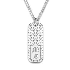 A lustrous woven textured, engravable dog tag pendant hangs handsomely around this stylish men's necklace. Fashioned in sterling silver, the 22-inch curb chain secures in place with a lobster clasp. Personalize with 2 characters. Personalized White Gold Dog Tag Necklace, Father's Day Dog Tag Necklace With Engraving Option, Sterling Silver Dog Tag Jewelry With Engraving Option, Sterling Silver Engraved Dog Tag Necklace, Engraved Sterling Silver Dog Tag Necklace, Sterling Silver Etched Dog Tag Necklace, Silver Dog Tag Necklaces For Father's Day, Silver Dog Tag Necklace For Father's Day, Silver Laser Engraved Dog Tag Jewelry