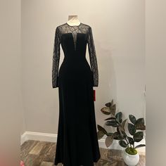 a black dress on display in a room