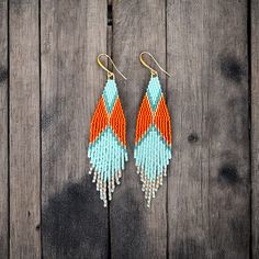 One of a kind fringe earrings between 2-3" long. Made with Miyuki Delica seed beads and gold plated ear wire. Orange Beaded Fringe Drop Earrings, Orange Beaded Fringe Jewelry For Gifts, Fuquay Varina Nc, October Sky, Beaded Fringe Earrings, Boho Fringe, Beaded Fringe, Fringe Earrings, Ear Wire