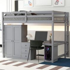 a loft bed with desk underneath it in a room that has carpeted flooring