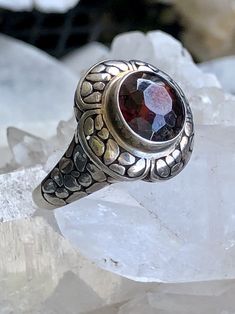 Textured Sterliing Silver Granet Vintage Ring Ring is a size 8 1/2 very cool, unique design Formal Garnet Stone Setting Rings, Garnet Rings With Stone Setting, Formal Garnet Rings With Stone Setting, Adjustable Round Garnet Ring, Elegant Large Stone Ruby Ring, Classic Round Ruby Ring With Stone Setting, Vintage Gemstone Dome Ring As Gift, Unique Gemstone Dome Ring, Vintage Gemstone Dome Ring For Gift