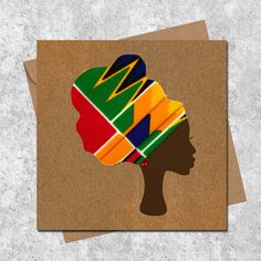 a card with a woman's head wearing a multicolored turban