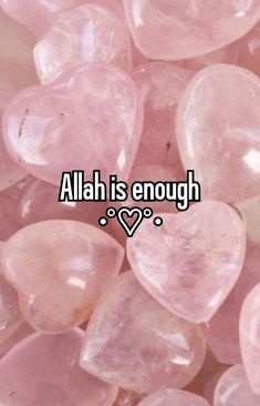 some pink rocks with the words aloh is enough on it and hearts in the middle