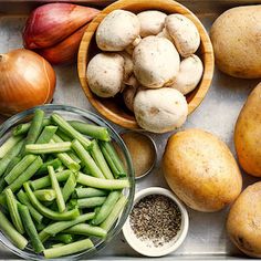 potatoes, green beans and onions on a tray