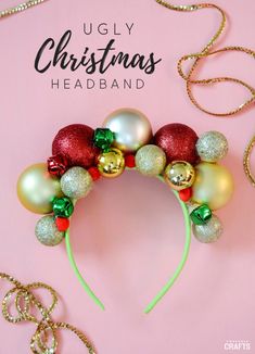 an ugly christmas headband made out of ornaments on a pink background with the words ugly christmas headband