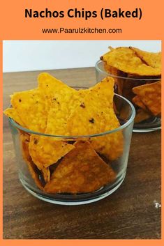 two glass bowls filled with nachos chips on top of a wooden table next to each other