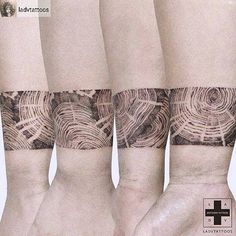 three different tattoos on the arms and legs, each with an intricate design in black ink