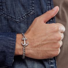 "Looking for a gift for your man? You've found the perfect item for this!  Introducing our stylish stainless steel anchor bracelet for men, the perfect accessory for any modern gentleman. Handcrafted with precision and attention to detail, this bracelet offers both durability and sophistication. The stainless steel construction ensures it is resistant to everyday wear and tear, while the anchor charm adds a nautical touch. Whether you're hitting the beach or headed to a formal event, this bracel Casual Stainless Steel Bracelet With Clasp, Casual Stainless Steel Bracelets, Casual Stainless Steel Bracelet, Casual Stainless Steel Chain Bracelet Gift, Silver Nautical Bracelets As A Gift, Casual Durable Silver Jewelry, Durable Metal Bracelet For Gift, Silver Anchor Bracelet Gift, Masculine Stainless Steel Jewelry For Gifts