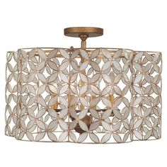 a semi flush light fixture with an intricate design