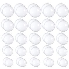 a large set of white glass knobs on a white background with clipping for text