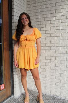 Effortlessly chic and oh-so-comfy, the Washed Milkmaid Romper features fitted sleeves and a playful tie front detail. With its flattering milkmaid style, this romper is a must-have for any fashion-forward wardrobe. Feel confident and stylish in this versatile piece! for reference Kami is 5’3 and wearing an XS! Orange Romper, Fitted Sleeves, Holiday Tops, Mock Neck Top, Ruffled Sleeve Top, Cardigan Jacket, Feel Confident, Sweater Jacket, Dress Skirt