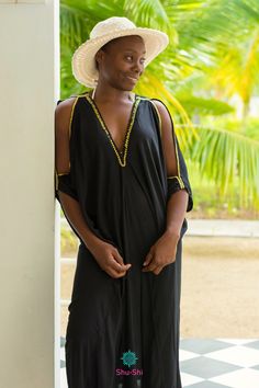 Add a touch of elegance to your summer look with our Black Embellished Kaftan featuring a deep V-neckline and gold beading. #BohemianFashion #ResortWear #blackdress Order on Amazon- https://shorturl.at/ksGM7 Summer V-neck Thobe Beach Cover-up, Summer V-neck Thobe For Beach Cover-up, Beaded Maxi Dress For Beach, Beaded Maxi Beach Dress, Beaded Maxi Dress For The Beach, Summer Festival Thobe With V-neck, Summer Festival V-neck Thobe, Black Maxi Thobe For Beach, Traveling Woman