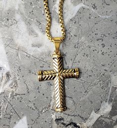 《《  SPIRITUAL COLLECTION  》》 THE DETAILS The "GOLD CHEVRON CROSS" Necklace is designed with an exquisitely detailed Gold Stainless Steel Cross, intricately Engraved in a Chevron Pattern, hung from a Gold Stainless Steel Box Chain available in your choice of length! View this Pendant Necklace in SILVER Stainless Steel here: 💠🔶️💠View entire SPIRITUAL COLLECTION here: https://www.etsy.com/shop/mrmackjewelry/?section_id=27046119 MATERIALS * 1 1/4" × 3/4" Gold Stainless Steel Chevron Cross Pendant Gold Stainless Steel Necklace With Wheat Chain, Gold Wheat Chain Necklace In Stainless Steel, Gold Stainless Steel Wheat Chain Necklace, Gold Cross Pendant Necklace With Box Chain, Gold Stainless Steel Pendant Cross Necklace, Gold Cross Necklace With Box Chain, Gold Stainless Steel Cross Necklace With Adjustable Chain, Gold Box Chain Necklace With Cross Pendant, Yellow Gold Stainless Steel Cross Pendant Necklace