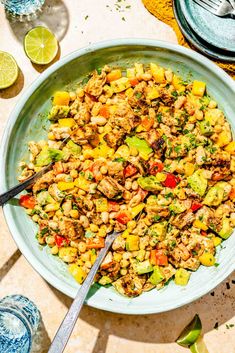 a large bowl filled with food on top of a table