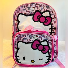 Backpack With Detachable Lunch Bag. Perfect For Back To School. Hello Kitty Travel Backpack, Hello Kitty Travel Backpack Standard Shape, Hello Kitty Rectangular Backpack For Back To School, Hello Kitty Travel Bag For Back To School, Hello Kitty Backpack For Daily Use, Hello Kitty Print Travel Backpack, Multicolor Hello Kitty Print Backpack, Multicolor Cat Design Standard Backpack, Pink Rectangular Backpack With Cat Design