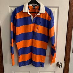 Boys Size Xl Ralph Lauren Nwt Shirt. All In Excellent Condition. Was Purchased For My Son And He Skipped This Size So Most Are Unworn. No Stains, Rips, Or Piling. 1. Nwt Polo By Rl Orange And Blue Striped Shirt. Orange Long Sleeve Cotton T-shirt, Orange Cotton Long Sleeve Shirt, Casual Multicolor Ralph Lauren Tops, Ralph Lauren Multicolor Casual Tops, Ralph Lauren Multicolor Cotton Top, Ralph Lauren Blue Relaxed Fit Shirt, Blue Relaxed Fit Ralph Lauren Shirt, Ralph Lauren Relaxed Fit Long Sleeve Tops, Ralph Lauren Striped Long Sleeve Tops