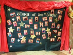 the stars of the show display is decorated with red and gold balloons, streamers, and pictures