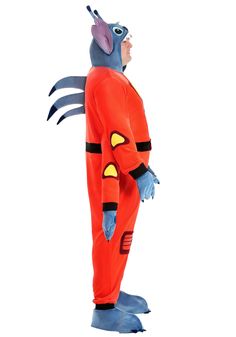 a man in an orange and blue costume is standing with his hands on his hips