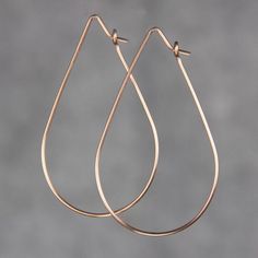 This unique teardrop hoop earrings are handmade using 14k rose gold filled. ;-) My contact number: 626-379-1904. Please contact me if you would like to order multiples or customize a design for your special event, I will be pleased to give you a discount on a quantity order. ;-) Purchases will be Modern Rose Gold Teardrop Earrings, Minimalist Rose Gold Teardrop Earrings, Everyday Rose Gold Teardrop Jewelry, Everyday Teardrop 14k Gold Filled Hoop Earrings, Teardrop Copper Hoop Earrings For Pierced Ears, Copper Teardrop Hoop Earrings With Ear Wire, Rose Gold Dangle Teardrop Earrings With Ear Wire, Rose Gold 14k Gold-filled Hoop Earrings, Minimalist Rose Gold Dangle Hoop Earrings