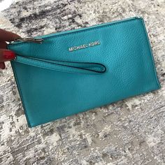 Michael Kors Wrislet New Never Used Excellent Beautiful Turquoise Wristlet. Shiny Silver Hardware Everyday Blue Pouch Wristlet, Blue Wristlet With Zipper Pouch For Travel, Blue Rectangular Wristlet With Removable Pouch, Blue Wristlet With Removable Pouch For Travel, Blue Clutch With Zipper Pouch, Blue Travel Wristlet With Removable Pouch, Blue Rectangular Bag With Wrist Strap, Blue Clutch Wristlet For Travel, Blue Wristlet For Travel