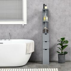 a white bath tub sitting next to a tall shelf filled with bottles and soaps