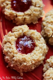 cookies with jam are on a red plate