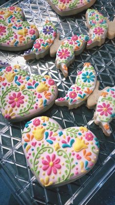 decorated sugar cookies on a cooling rack ready to be eaten