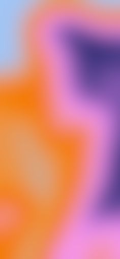 an abstract blurry background with orange and purple colors