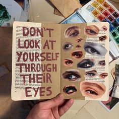 someone holding up an open book with pictures of their eyes and the words don't look at yourself through their eyes