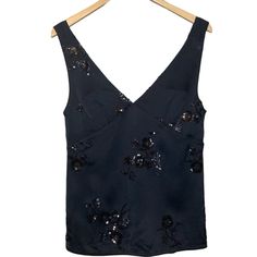 Beautiful Top With Floral Pattern Sequin Embroidery.Will Go Great With Any Outfit Can Be Worn On Its Own Or Under Blazer V-Neck Front And Back Pull Over Style,No Zipper Or Buttons Small Side Slits Sz Xs Shoulder To Hem 23 1/4” Armpit To Armpit Laying Flat 16 1/4” Brand New With Original Tags *43 Zara Sparkly Top, Black V-neck Tops With Floral Embroidery, Spring V-neck Tops With Sequins, Fitted V-neck Embroidered Top For Spring, Spring V-neck Sequin Tops, Zara Fitted V-neck Tops, Elegant Black Embroidered Summer Top, Zara Black Embroidered Tops, Chic V-neck Top With Floral Embroidery