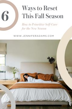 a woman laying on top of a bed in a bedroom