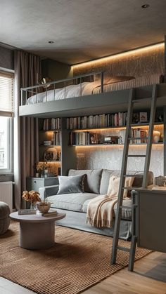 a living room filled with furniture and bookshelves next to a window covered in curtains