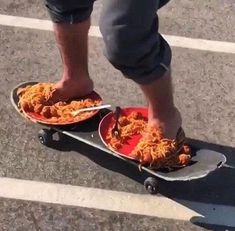 a person standing on top of a skateboard with food in it